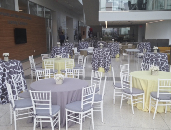 table settings with purple and yellow linens