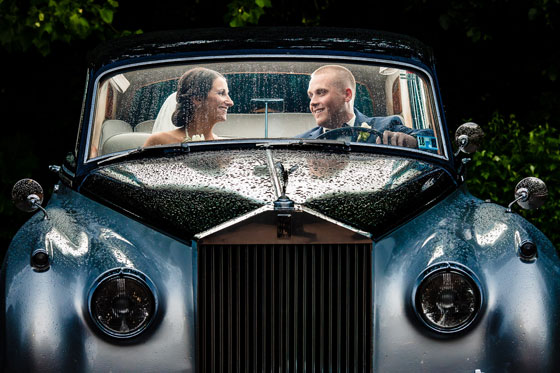 Bride and Groom in Antique Car