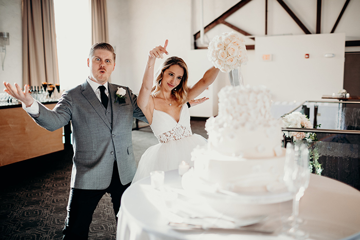 Bride and Groom with Wedding Cake